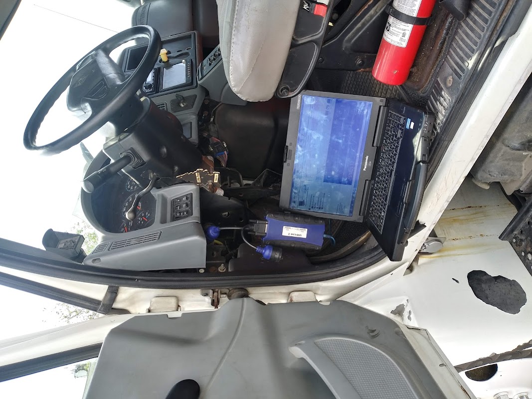 Laptop connected to truck for diagnostics